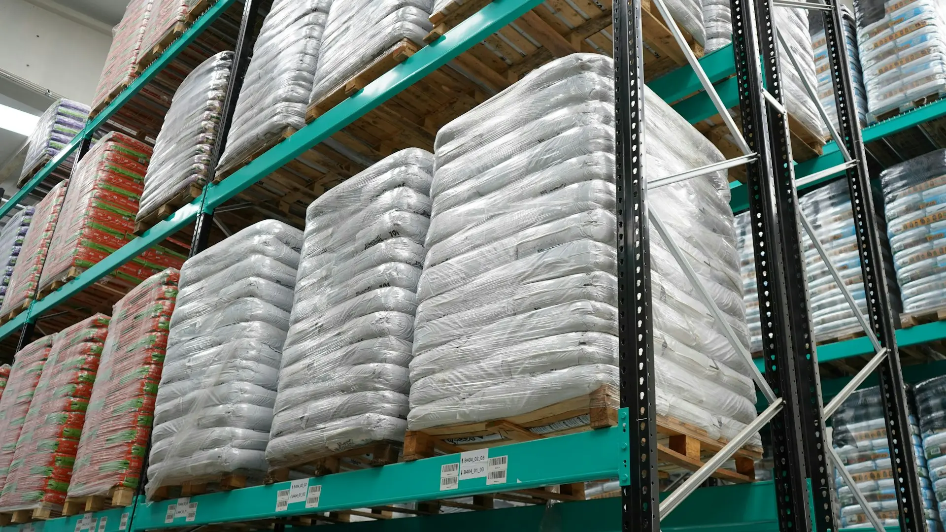 A pallet filled with lots of white and orange items